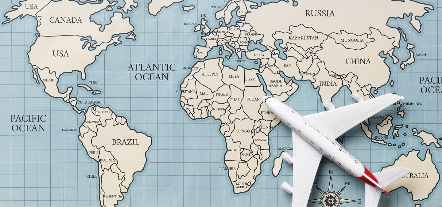 map of the world with a compass on it